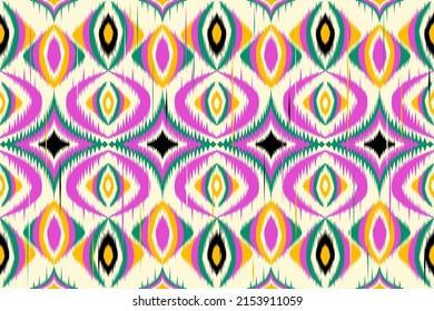 Ethnic Ikat Geometric oriental pattern on fabric in Indonesia and other Asian countries design for background and wallpaper. Seamless striped pattern in Aztec style. Folk embroidery.