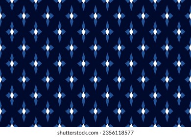 Ethnic ikat geometric seamless pattern. design for carpet, clothing, fabric