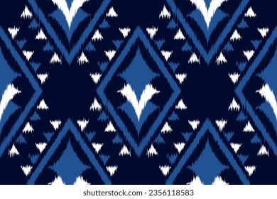 Ethnic ikat geometric seamless pattern. design for carpet, clothing, fabric