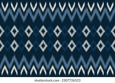 Ethnic Ikat seamless fabric pattern geometric.African Ikat embroidery Ethnic oriental pattern navy blue background. Abstract,vector,illustration.Texture,clothing,scarf,decoration,carpet,wallpaper.