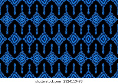 Patrón ininterrumpido de ikat étnico, estilo africano, vector abstracto, bordado de Chevron, bordado de Paisley, patrón aborigen navajo, motivos aztecos y tribales, patrón geométrico, estilo dibujado a mano vectorial.

