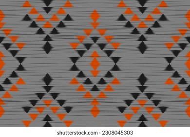 Ethnic Ikat seamless pattern traditional. Aztec geometric ornament print. American, Mexican style. Design for background, wallpaper, illustration, fabric, clothing, carpet, textile, batik, embroidery.