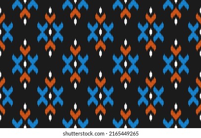 Patrón de ikat étnico sin fisuras en las tribus. de estilo americano y mexicano. Diseño para fondo, papel pintado, ilustración, tela, ropa, alfombra, textil, batik, bordado.