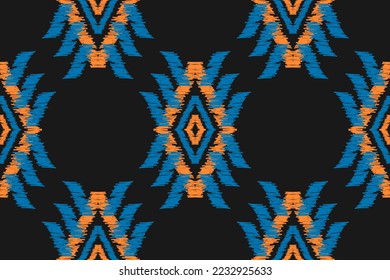 Patrón de ikat étnico sin fisuras en las tribus. Huella de ornamento étnico geométrico azteca. Estilo de patrón de Ikat. Diseño para fondo, papel pintado, ilustración, tela, ropa, alfombra, textil, batik, bordado.