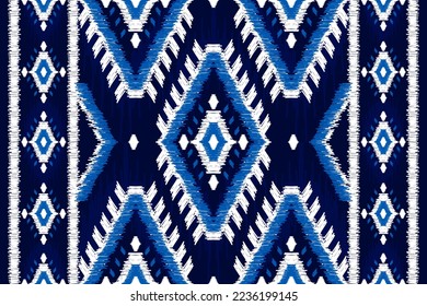 Ethnic ikat seamless pattern in tribal. Aztec geometric ethnic ornament print. Ikat pattern style. Design for background, wallpaper, illustration, fabric, clothing, carpet, textile, batik, embroidery.