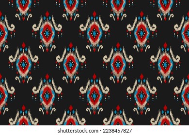 Patrón de ikat étnico sin fisuras en las tribus. Huella de ornamento étnico geométrico azteca. Estilo de patrón de Ikat. Diseño para fondo, papel pintado, ilustración, tela, ropa, alfombra, textil, batik, bordado.
