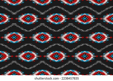 Ethnic ikat seamless pattern in tribal. Aztec geometric ethnic ornament print. Ikat pattern style. Design for background, wallpaper, illustration, fabric, clothing, carpet, textile, batik, embroidery.