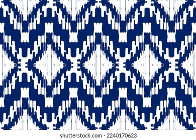 Patrón de ikat étnico sin fisuras en las tribus. Huella de ornamento étnico geométrico azteca. Estilo de patrón de Ikat. Diseño para fondo, papel pintado, ilustración, tela, ropa, alfombra, textil, batik, bordado.