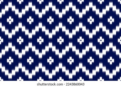 Ethnic ikat seamless pattern in tribal. Aztec geometric ethnic ornament print. Ikat pattern style. Design for background, wallpaper, illustration, fabric, clothing, carpet, textile, batik, embroidery.