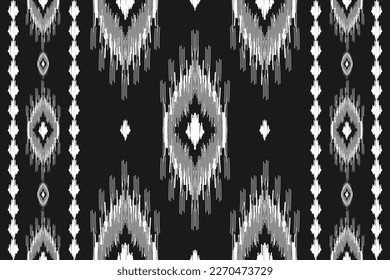 Ethnic ikat seamless pattern in tribal. American, Mexican style. Aztec geometric ornament print. Design for background, wallpaper, illustration, fabric, clothing, carpet, textile, batik, embroidery.