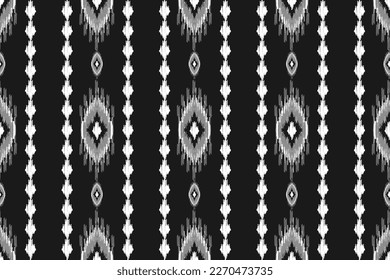 Patrón de ikat étnico sin fisuras en las tribus. de estilo americano y mexicano. Impresión de ornamento geométrico azteca. Diseño para fondo, papel pintado, ilustración, tela, ropa, alfombra, textil, batik, bordado.