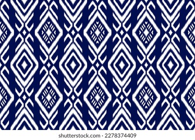 Patrón de ikat étnico sin fisuras en las tribus. de estilo americano y mexicano. Impresión de ornamento geométrico azteca. Diseño para fondo, papel pintado, ilustración, tela, ropa, alfombra, textil, batik, bordado.