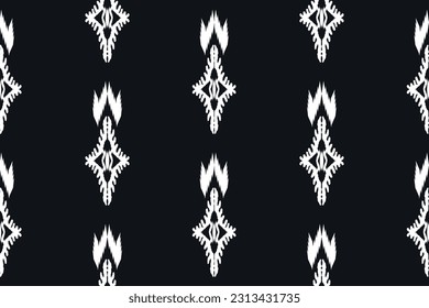 Patrón de ikat étnico sin fisuras en las tribus. Huella de ornamento étnico geométrico azteca. Estilo de patrón de Ikat. Diseño para fondo, papel pintado, ilustración, tela, ropa, alfombra, textil, batik, bordado.