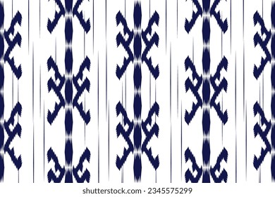 Ethnic ikat seamless pattern in tribal. Aztec geometric ethnic ornament print. Ikat pattern style. Design for background, wallpaper, illustration, fabric, clothing, carpet, textile, batik, embroidery.
