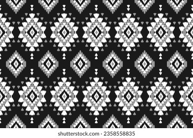 Ethnic ikat seamless pattern in tribal. Aztec geometric ethnic ornament print. Ikat pattern style. Design for background, wallpaper, illustration, fabric, clothing, carpet, textile, batik, embroidery.