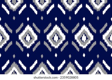 Ethnic ikat seamless pattern in tribal. Aztec geometric ethnic ornament print. Ikat pattern style. Design for background, wallpaper, illustration, fabric, clothing, carpet, textile, batik, embroidery.