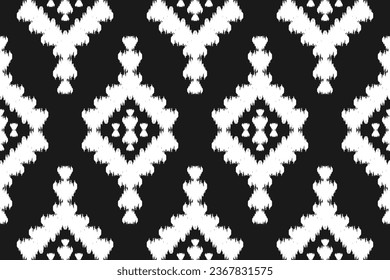 Patrón de ikat étnico sin fisuras en las tribus. Huella de ornamento étnico geométrico azteca. Estilo de patrón de Ikat. Diseño para fondo, papel pintado, ilustración, tela, ropa, alfombra, textil, batik, bordado.
