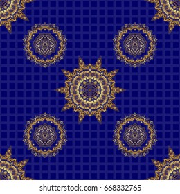 Ethnic Indian folklore. Vector abstract seamless patchwork background with blue and golden ornaments, geometric Moroccan seamless pattern. Stylized golden stars, snowflakes and grids.