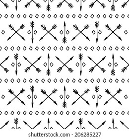Ethnic monochrome seamless pattern with arrows. Hand drawn doodles. Beautiful background. Vector illustration. Endless texture can be used for printing onto fabric and paper or scrap booking.