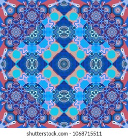Ethnic motif. Seamless pattern in violet, blue and pink colors. Vintage mosaics. Vector illustration.