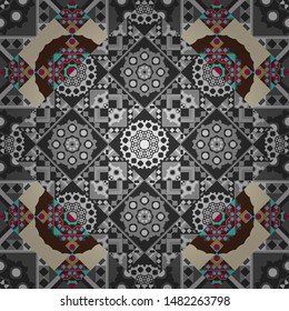 Ethnic motif. Vector illustration. Seamless pattern in beige, brown and gray colors. Vintage mosaics.