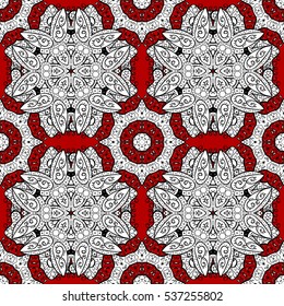 Ethnic ornament mandala geometric patterns in white colors on red floral background. Seamless pattern.