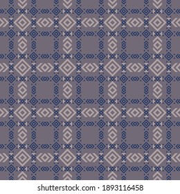 Ethnic ornament. Vector geometric seamless pattern with rhombuses, squares, triangles, grid. Tribal motif. Dark blue, lilac and gray color. Abstract background texture. Vintage style. Repeat design