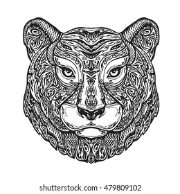 Ethnic ornamented tiger, puma, panther, leopard or jaguar. Hand drawn vector illustration with floral elements