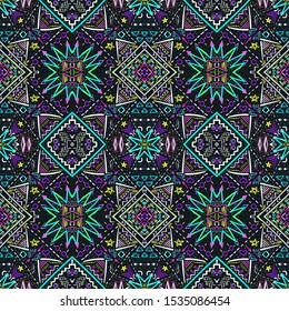 Ethnic pattern. Aztec fabric. Geometric tribal ornament. Brazilian or Mexican print. Clothes or interior design. Traditional homespun textile. Vector seamless pattern.