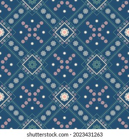 ethnisches Muster mit geometrischer, nahtloser Blume auf blauem Hintergrund für Stoff