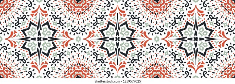 Ethnic pattern. Mediterranean seamless wallpaper. Portuguese tile. Turkish ornament on the carpet. Moroccan mosaic. Spanish porcelain. Ceramic dishes, folk print. Spanish Talavera. Ornate rug. 