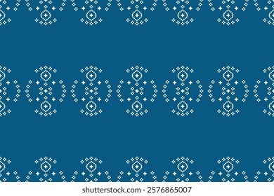 Ethnic pattern traditional motif ikat geometric fabric pattern cross stitch.Ikat embroidery Ethnic oriental Pixel blue background.Abstract,vector,illustration. Texture,decoration,wallpaper.