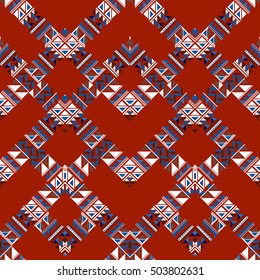 Ethnic pattern triangle ornament isolated on a red. Geometric folk background primitive elements ornamental design.
