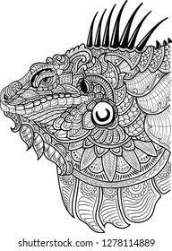 Ethnic patterned ornate hand drawn head of Iguana. Black and white doodle vector illustration. Sketch for tattoo, poster, print or t-shirt.