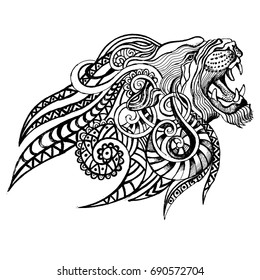 Ethnic patterned ornate hand drawn head of Lion. Black and white doodle vector illustration. Sketch for tattoo, poster, print or t-shirt.Coloring pages.