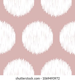 Ethnic pink and white polka dot seamless pattern. Boho nude circle abstract repeat textile print. Folk wallpaper.