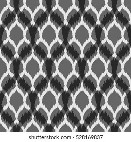Ethnic seamless black and gray pattern. Boho abstract textile print. Geometric wallpaper