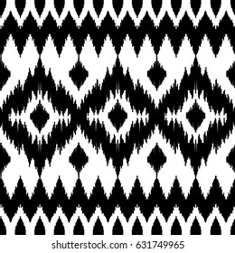 Ethnic seamless black and white pattern. Boho abstract textile print. Geometric wallpaper with squares.