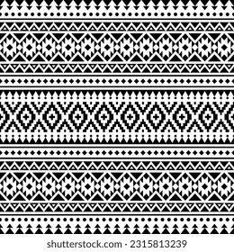 Ethnic seamless geometric pattern. Aztec tribal abstract vector texture. Black and white colors. Design for textile, fabric, clothes, curtain, rug, ornament, wallpaper, background, paper.