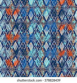 Ethnic seamless geometric pattern. Bright colored structure of the traditional folk forms. 