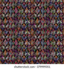 Ethnic seamless geometric pattern. Bright colored structure of the traditional folk forms. 
