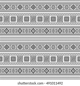 Ethnic seamless monochrome pattern. Aztec geometric background. Tribal print. Navajo fabric. Modern abstract wallpaper. Vector illustration. For paper, textile design.