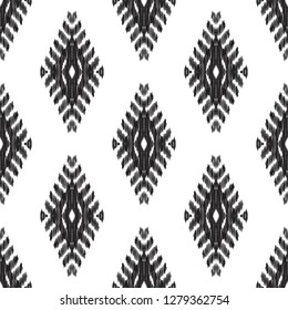Ethnic seamless pattern. Boho ikat art ornament. Can be used for textile, wallpaper, wrapping paper, greeting card background, phone case print. Black and white vector illustration.