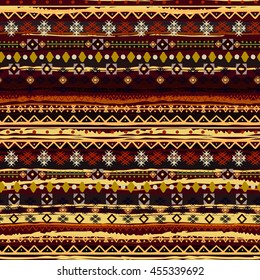 Ethnic seamless pattern. Boho print. Old background texture. Brush strokes, floral, geometric ornament.  Carpet
