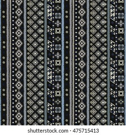 Ethnic seamless pattern. Boho print. Old background texture. Pixel, dots. Geometric shapes. Wallpaper