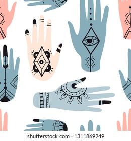 Ethnic seamless pattern with colorful hands. Boho tribal elements. Henna tattoo vector background. Hand drawn mehendi ornaments on palms. Palmistry and esoteric concept.