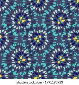 Ethnic seamless pattern with dot circles motif. Abstract geometric ornament in navy blue and aquamarine colors. Designed for wallpaper, textile, wrapping paper, fabric print. Vector illustration.