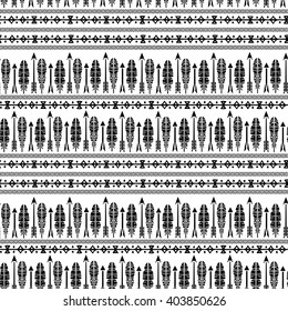 Ethnic seamless pattern, feathers, arrows. Tribal art boho print, border rustic pattern. Background texture, decoration