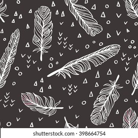 Ethnic seamless pattern with Feathers and chaotic dots and triangles. Vector illustration