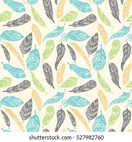 Ethnic seamless pattern with feathers. Decorative geometric elements. Retro hand drawings. Vector illustration.